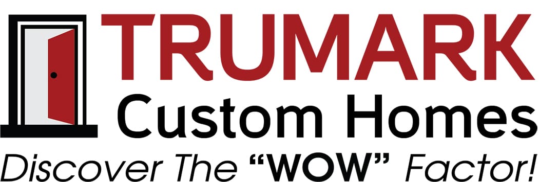 A red and white logo for truman custom homes.